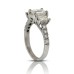 2.35 ct. TW Emerald Cut Diamond Three Stone Accented Engagement Ring in 18K Gold